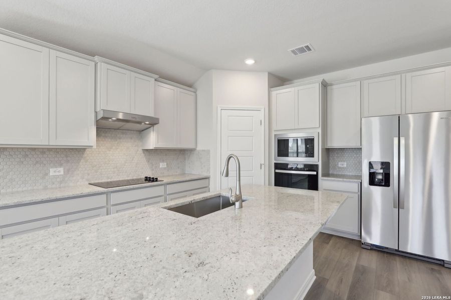 Furnished interior view inside a new home in Legendary Trails - Classic Series, Cibolo (Image 17).