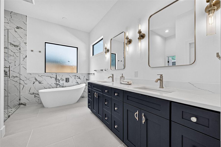 Huge primary bath with bathtub and separate shower Huge primary bath with bathtub and separate shower