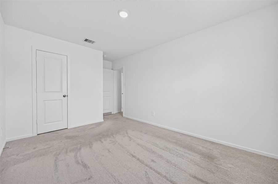 Secondary bedroom has carpet. Secondary bedroom has carpet.