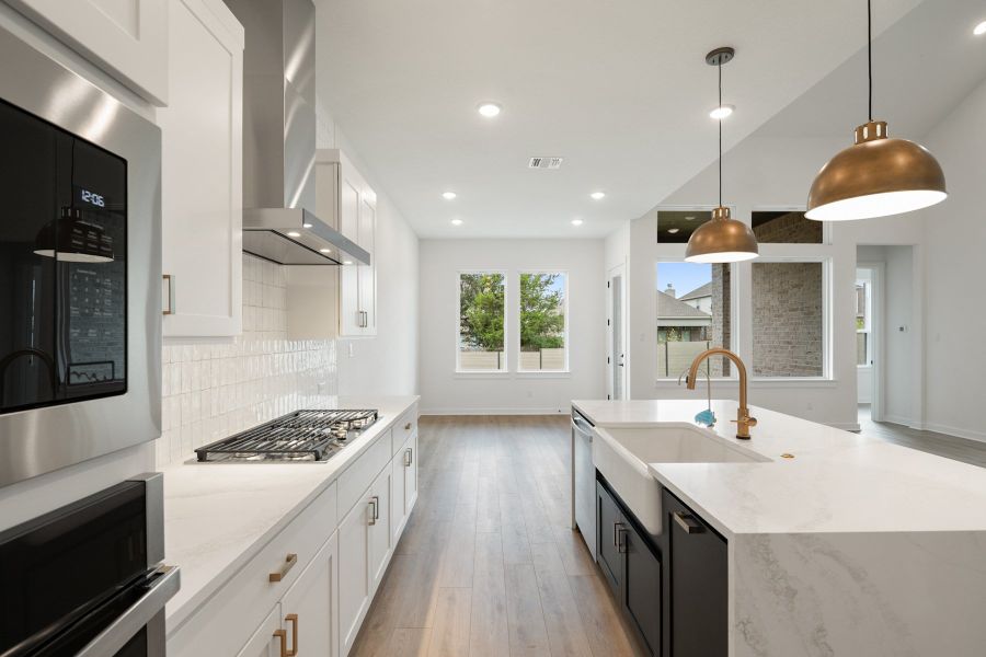 Furnished interior view inside a new home in Wolf Ranch, Georgetown (Image 12).