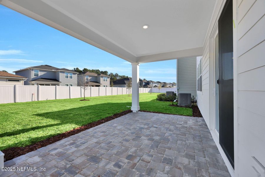 Exterior details and patio area of a home in Murray Farms, Middleburg (Image 3).