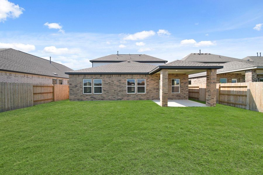 Exterior details and patio area of a home in Sunterra, Katy (Image 4). Exterior details and patio area of a home in Sunterra, Katy (Image 4).