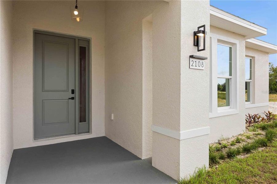 Exterior details and patio area of a home in , Winter Haven (Image 2). Exterior details and patio area of a home in , Winter Haven (Image 2).