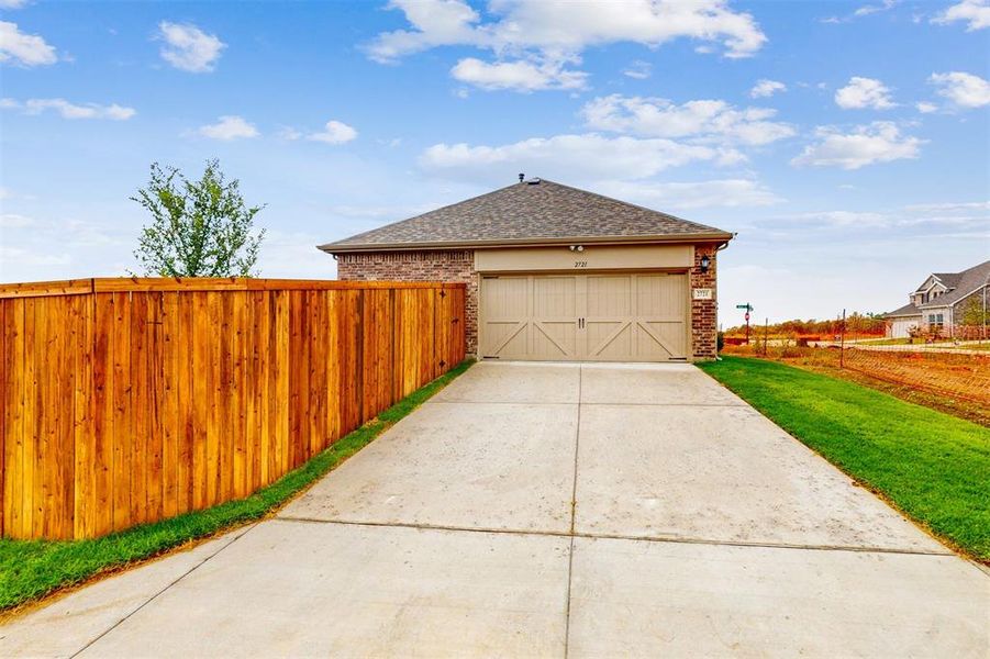 Front exterior of a new home in Lilybrooke at Legacy Hills, Celina, TX, highlighting curb appeal (Image 20). Front exterior of a new home in Lilybrooke at Legacy Hills, Celina, TX, highlighting curb appeal (Image 20).