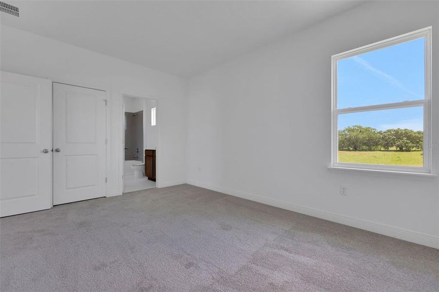 Spacious, unfurnished interior of a new home in Serenade at Ovation, Winter Garden (Image 26). Spacious, unfurnished interior of a new home in Serenade at Ovation, Winter Garden (Image 26).