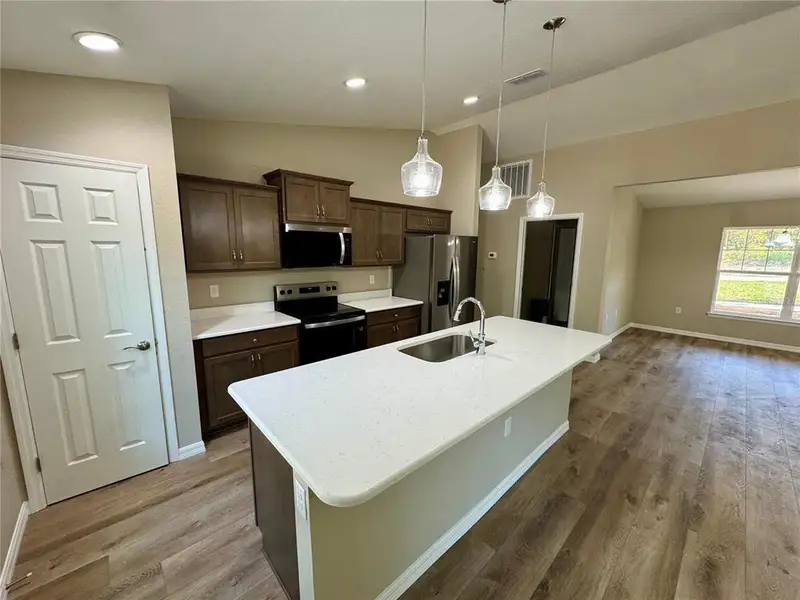 Furnished interior view inside a new home in , Dunnellon (Image 4).