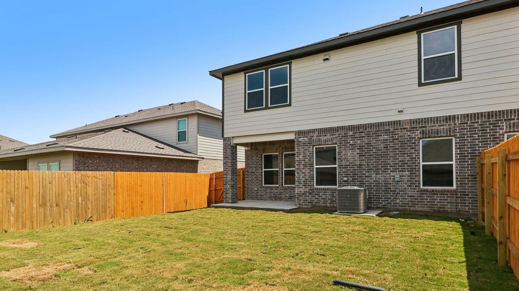 Exterior details and patio area of a home in Palomino, Manor (Image 22).