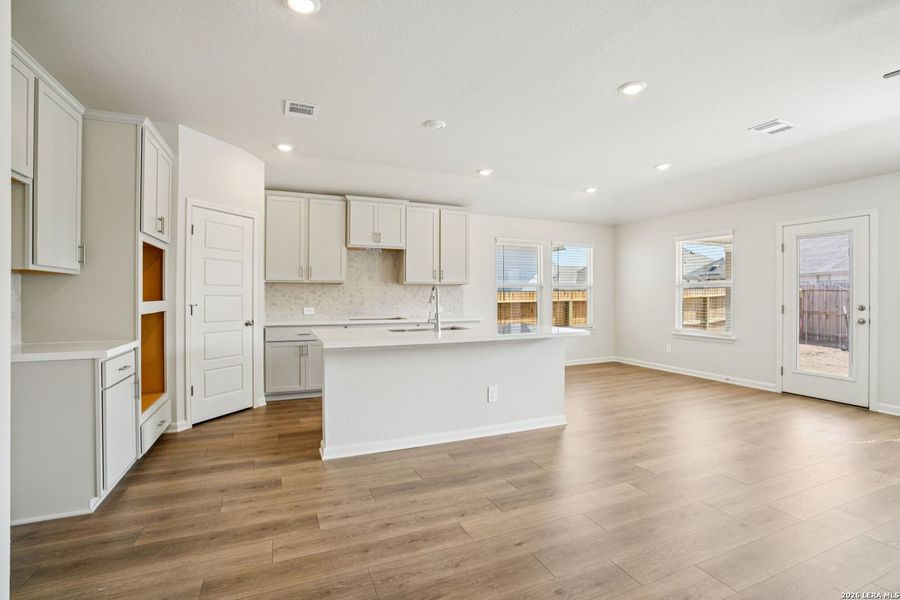 Furnished interior view inside a new home in Estancia Ranch - Classic Series, San Antonio (Image 13).