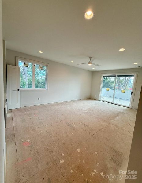 Bonus Room with wetbar, balcony and clear skyline view