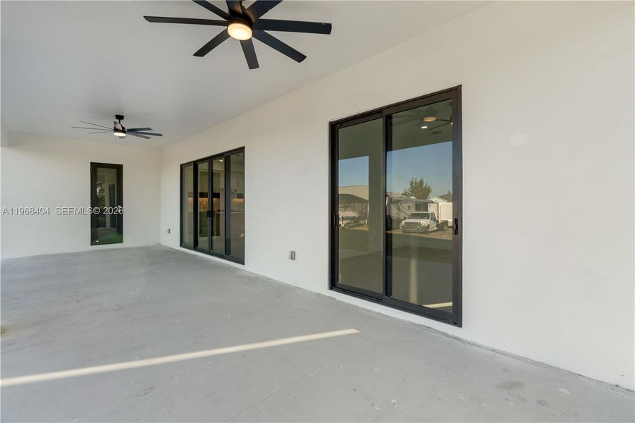 Exterior details and patio area of a home in , Port Charlotte (Image 34).