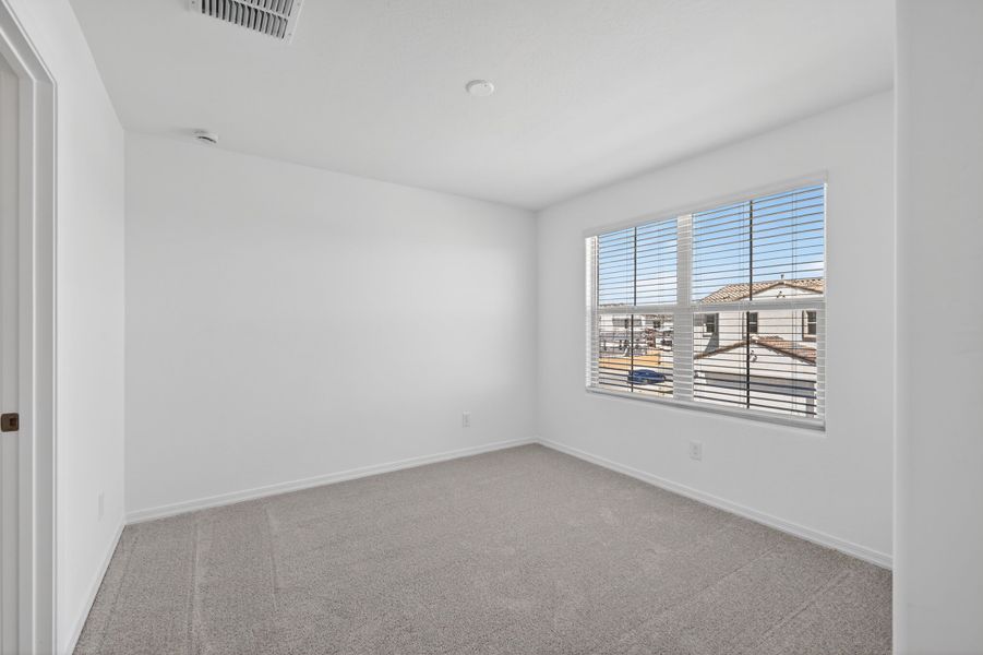 Spacious, unfurnished interior of a new home in Artisan at Asante, Surprise (Image 22).