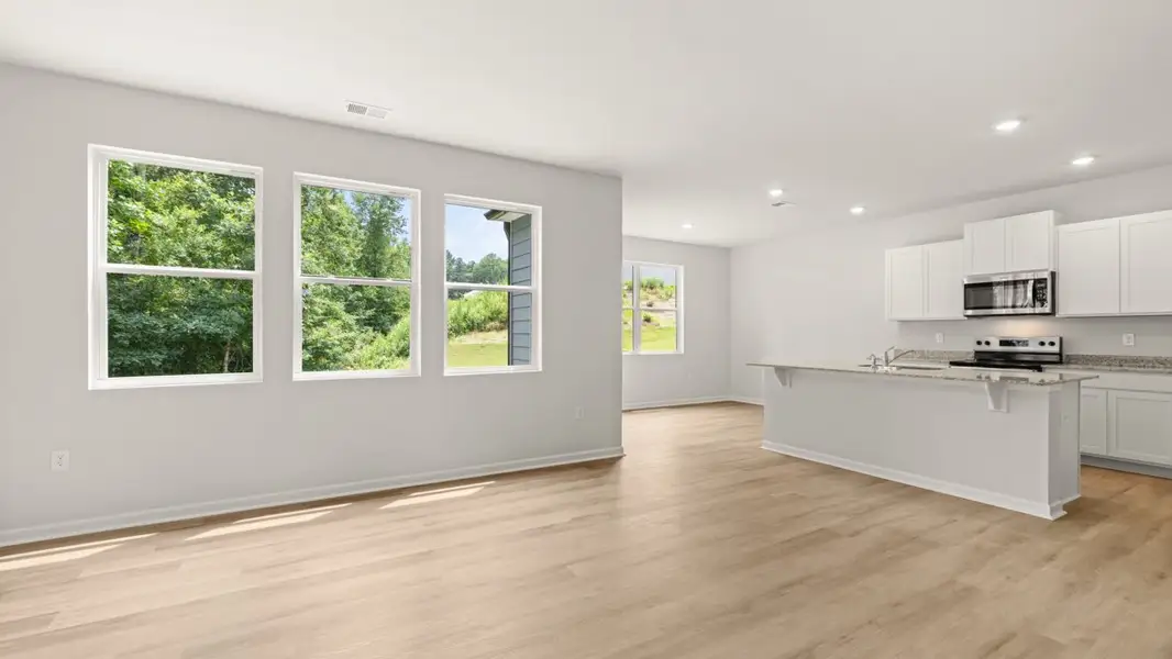 Representative unfurnished interior of a home built from the Darwin by D.R. Horton in Oaks at Cedar Grove, Fairburn (Image 12).