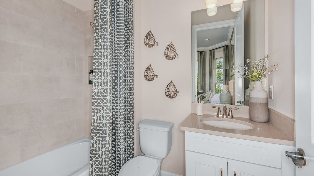 Representative furnished interior of a home built from the Farnese by Taylor Morrison in Esplanade by the Islands, Naples (Image 4).