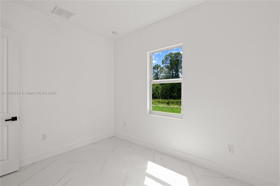 Spacious, unfurnished interior of a new home in , Lehigh Acres (Image 22).