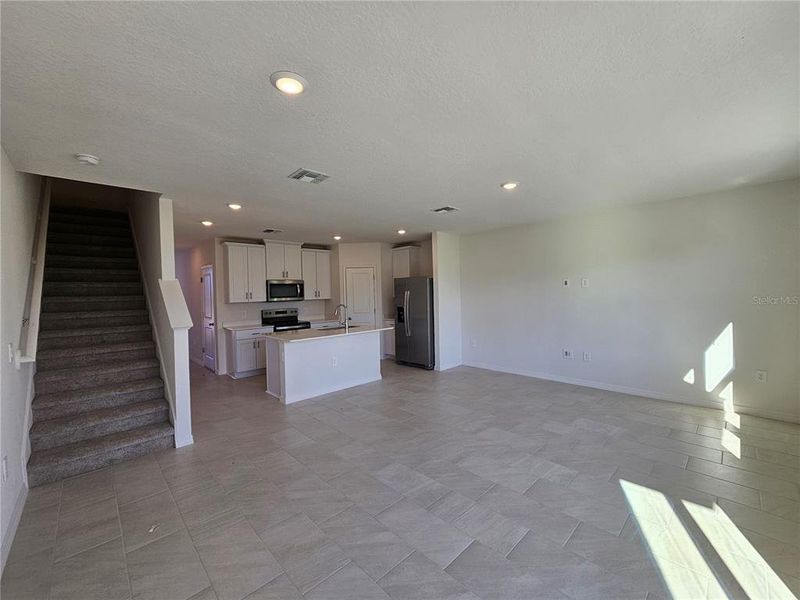 Spacious, unfurnished interior of a new home in The Reserve at Hammock Oaks Townes, Lady Lake (Image 10). Spacious, unfurnished interior of a new home in The Reserve at Hammock Oaks Townes, Lady Lake (Image 10).