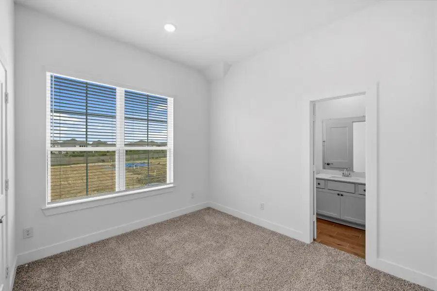 Spacious, unfurnished interior of a new home in Bridgeland, Cypress (Image 11).