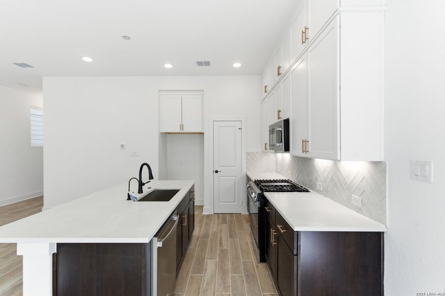 Furnished interior view inside a new home in Rose Hill, San Antonio (Image 11).