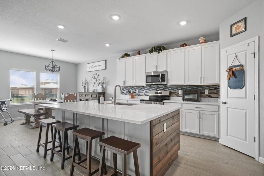 Furnished interior view inside a new home in Granary Park, Green Cove Springs (Image 15).