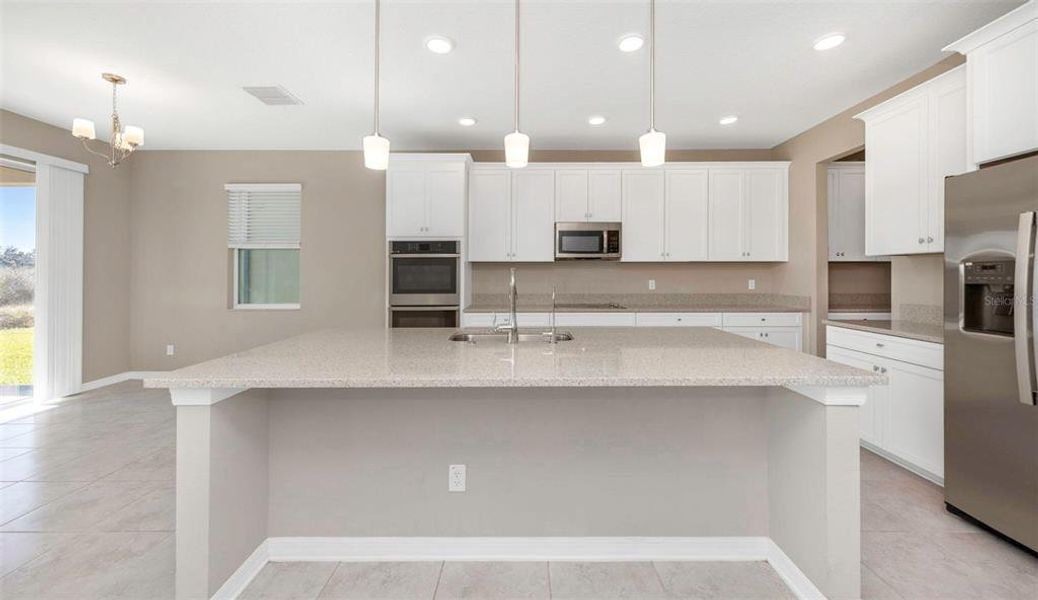 Furnished interior view inside a new home in , Zephyrhills (Image 8).