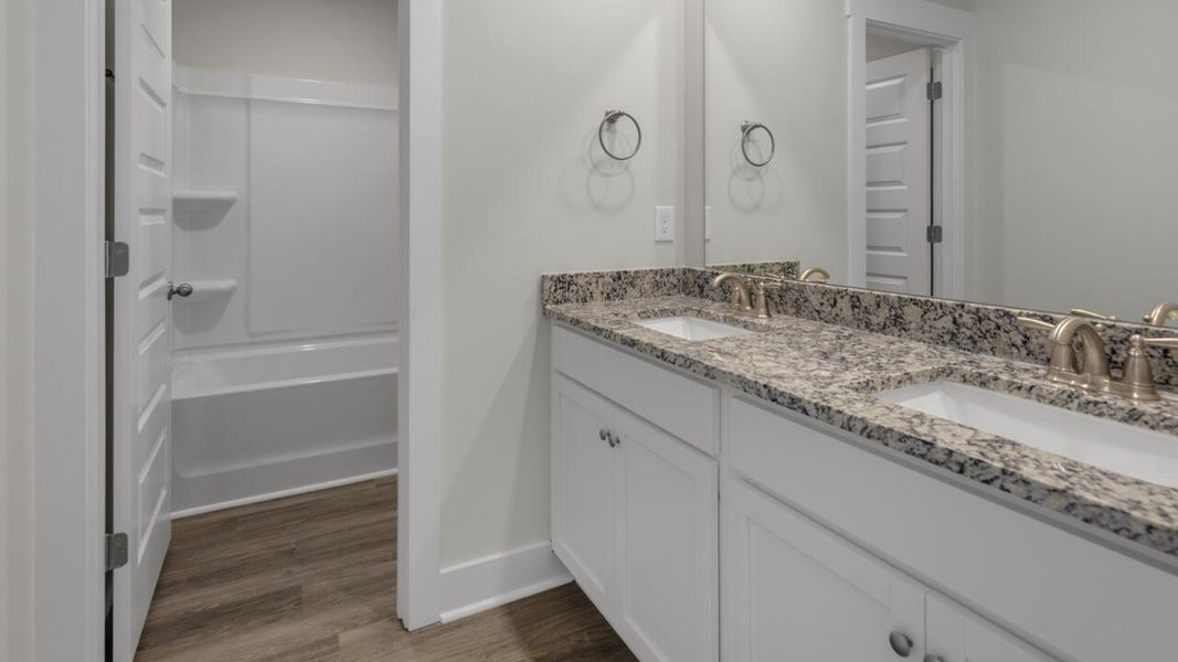 Representative furnished interior of a home built from the WREN by D.R. Horton in Indigo Preserve, Leland (Image 14). Representative furnished interior of a home built from the WREN by D.R. Horton in Indigo Preserve, Leland (Image 14).