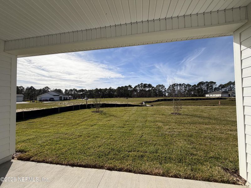 Exterior details and patio area of a home in The Cypress Series at Reserve East, Flagler Beach (Image 20).