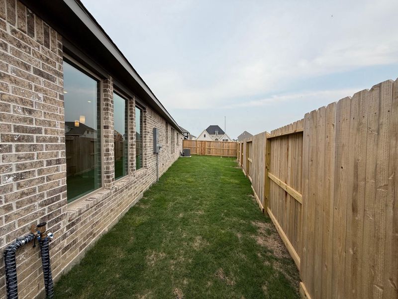 Exterior details and patio area of a home in Candela, Richmond (Image 4).
