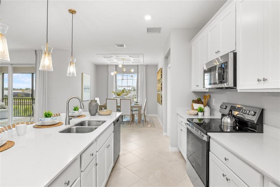 Furnished interior view inside a new home in Wellen Park Golf & Country Club, Venice (Image 13).