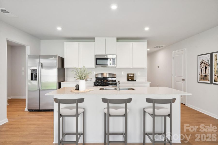 Example Photo Example Photo