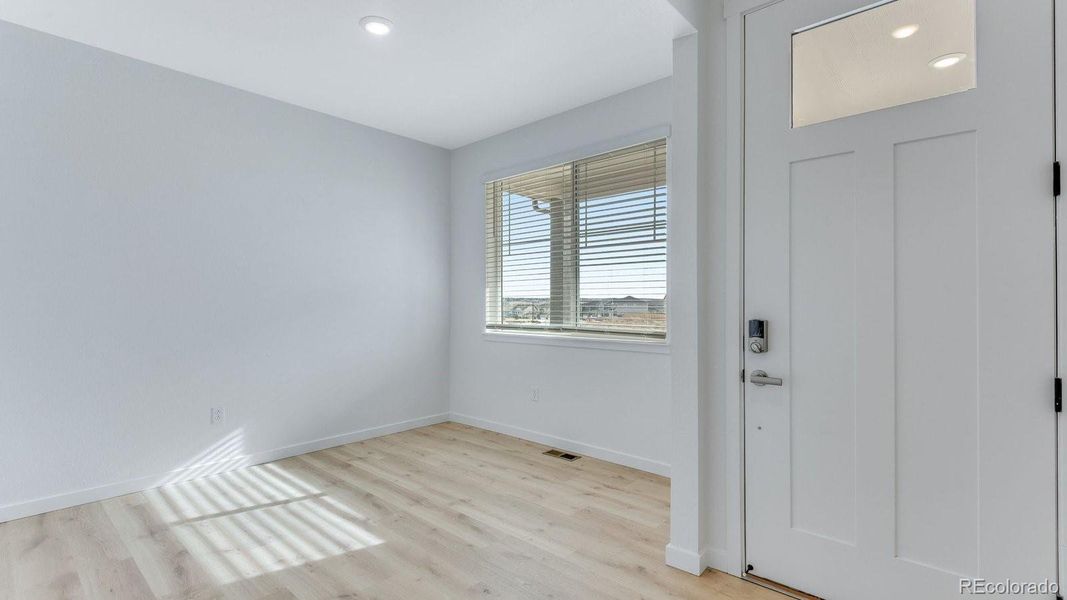 Spacious, unfurnished interior of a new home in Trails at Crowfoot, Parker (Image 27).