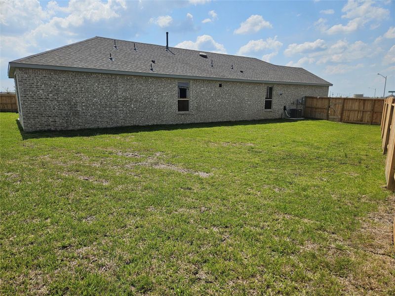 Front exterior of a new home in , Dayton, TX, highlighting curb appeal (Image 2). Front exterior of a new home in , Dayton, TX, highlighting curb appeal (Image 2).