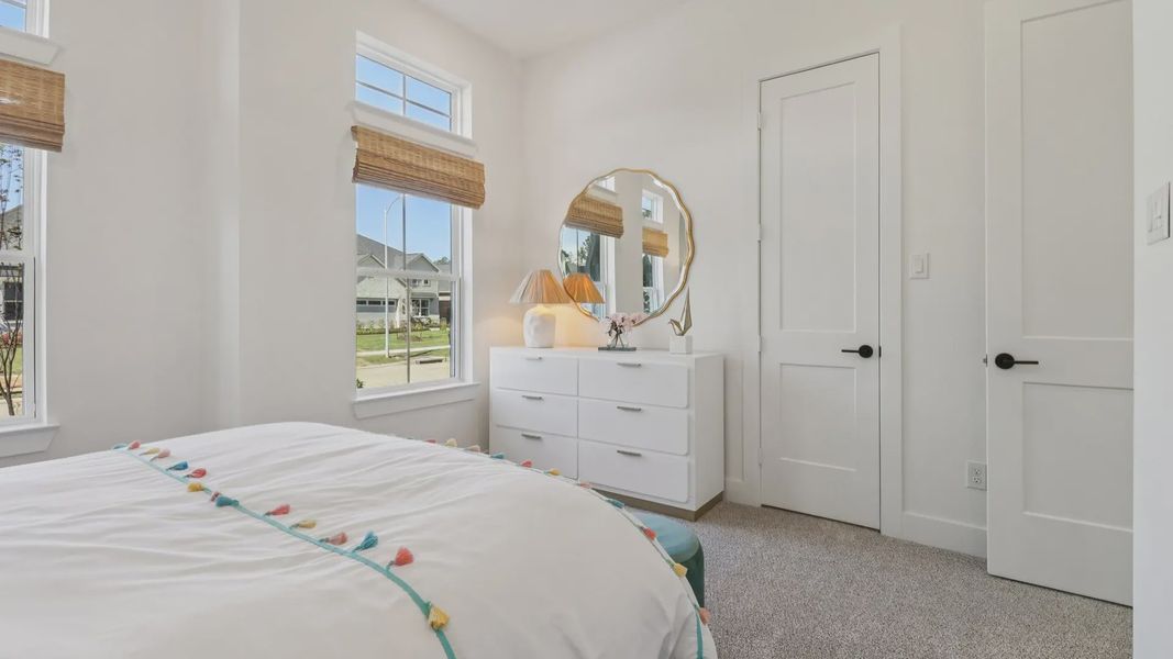 Representative furnished interior of a home built from the Marbella by Chesmar Homes in Audubon, Magnolia (Image 27).