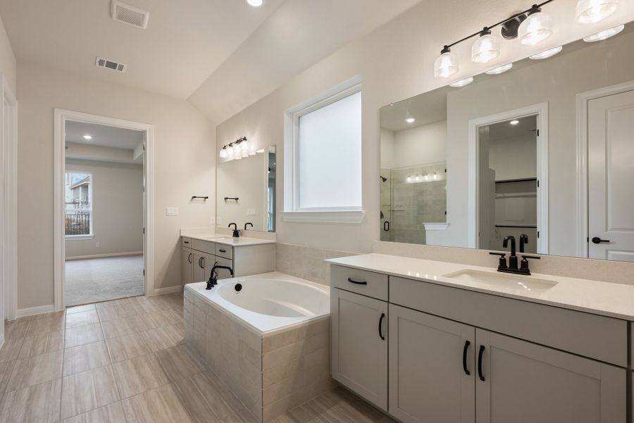 Representative furnished interior of a home built from the Carolina by Ashton Woods in The Estates at La Cima, San Marcos (Image 14). Representative furnished interior of a home built from the Carolina by Ashton Woods in The Estates at La Cima, San Marcos (Image 14).