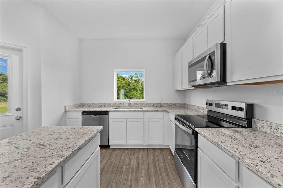 Furnished interior view inside a new home in , Poinciana (Image 4).