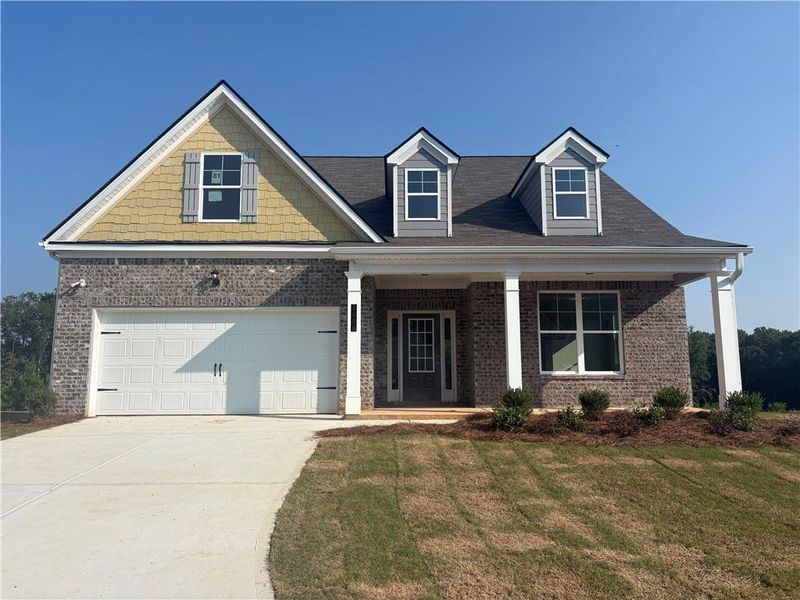 Front exterior of a new home in Highland Park, Stonecrest, GA, highlighting curb appeal (Image 1). Front exterior of a new home in Highland Park, Stonecrest, GA, highlighting curb appeal (Image 1).