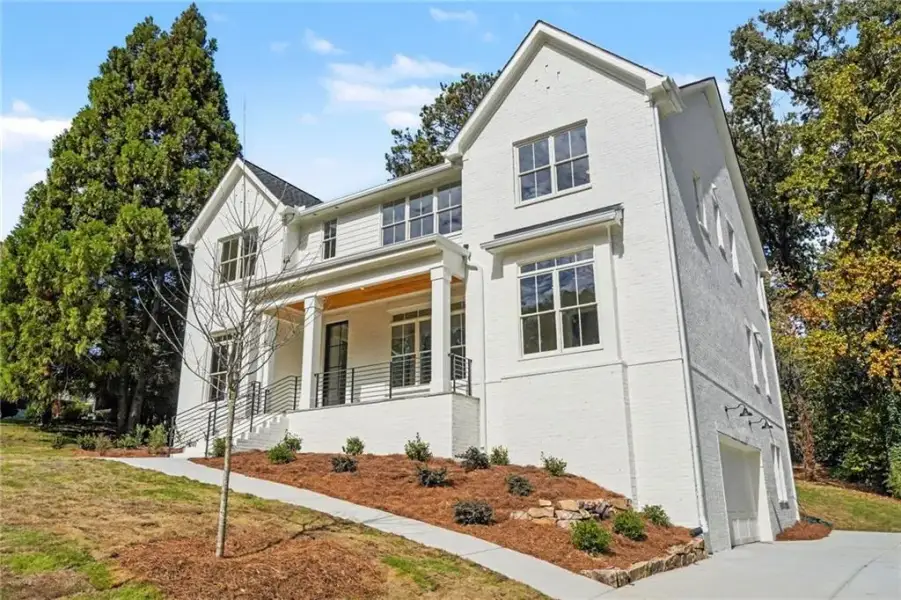 Front exterior of a new home in , Atlanta, GA, highlighting curb appeal (Image 27).