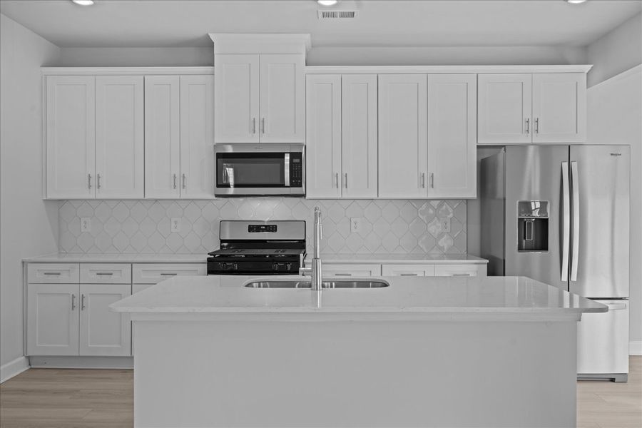 Furnished interior view inside a new home in Brayfield Manor - Heritage Collection, Wellford (Image 3).
