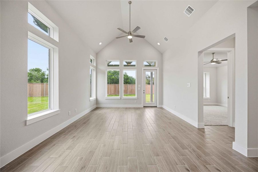 Spacious, unfurnished interior of a new home in Ellwood, Iowa Colony (Image 27).