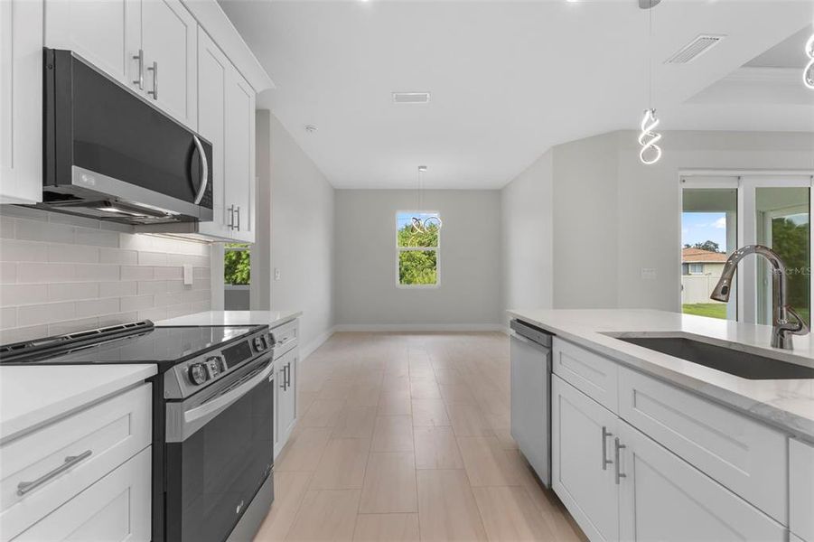 Furnished interior view inside a new home in , North Port (Image 9).