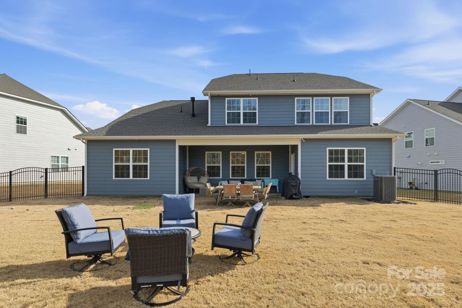 Your large backyard is bordered by greenspace, offering privacy and the perfect canvas to make your own outdoor oasis Your large backyard is bordered by greenspace, offering privacy and the perfect canvas to make your own outdoor oasis