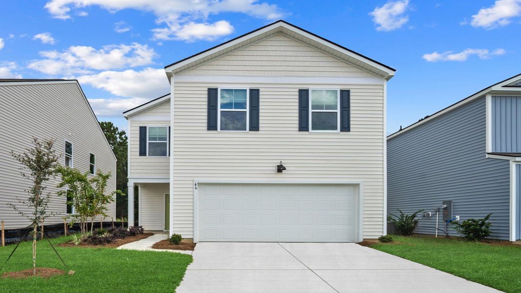 Front exterior of a new home in Rice Hope, Port Wentworth, GA, highlighting curb appeal (Image 1).