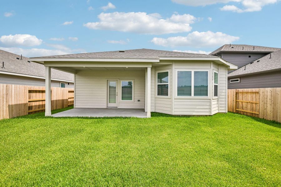 Exterior details and patio area of a home in Riviera Pines - Premier Series, Huffman (Image 4).