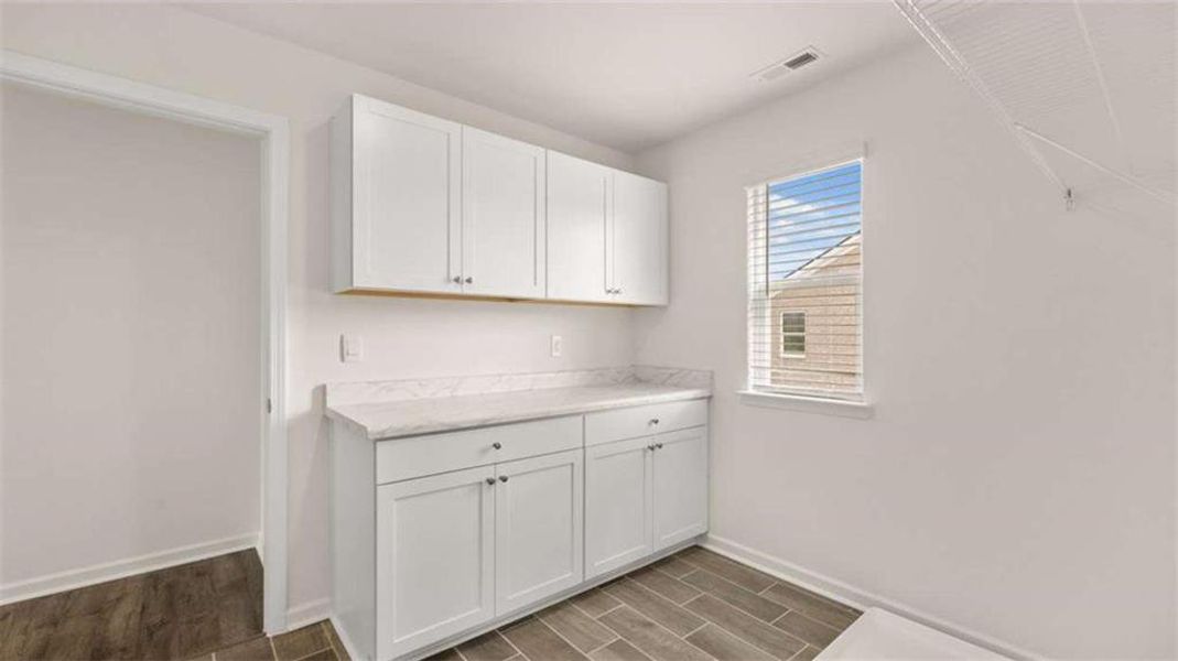 Furnished interior view inside a new home in Water Oak Estates, Lawrenceville (Image 12).