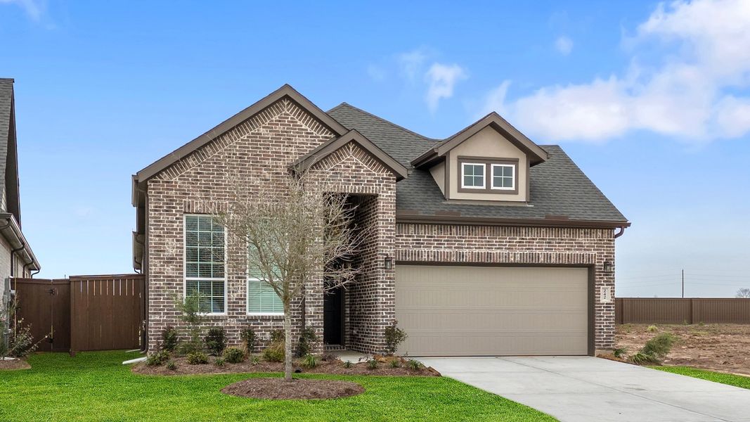 Front exterior of a new home in Brookewater, Rosenberg, TX, highlighting curb appeal (Image 22).