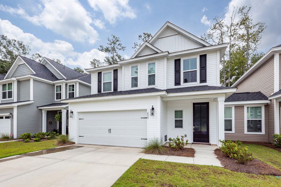 Front exterior of a new home in Hampton Woods, Summerville, SC, highlighting curb appeal (Image 21). Front exterior of a new home in Hampton Woods, Summerville, SC, highlighting curb appeal (Image 21).
