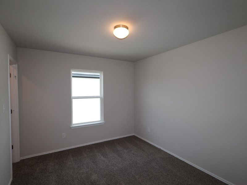 Spacious, unfurnished interior of a new home in Heritage, Dripping Springs (Image 9).