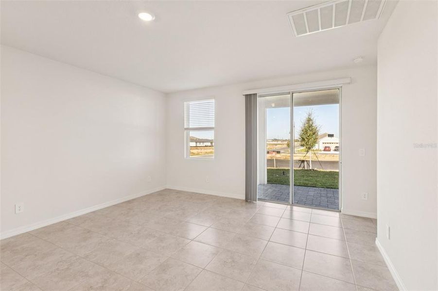 Spacious, unfurnished interior of a new home in The Reserve at Hammock Oaks - Classic Series, Lady Lake (Image 9).