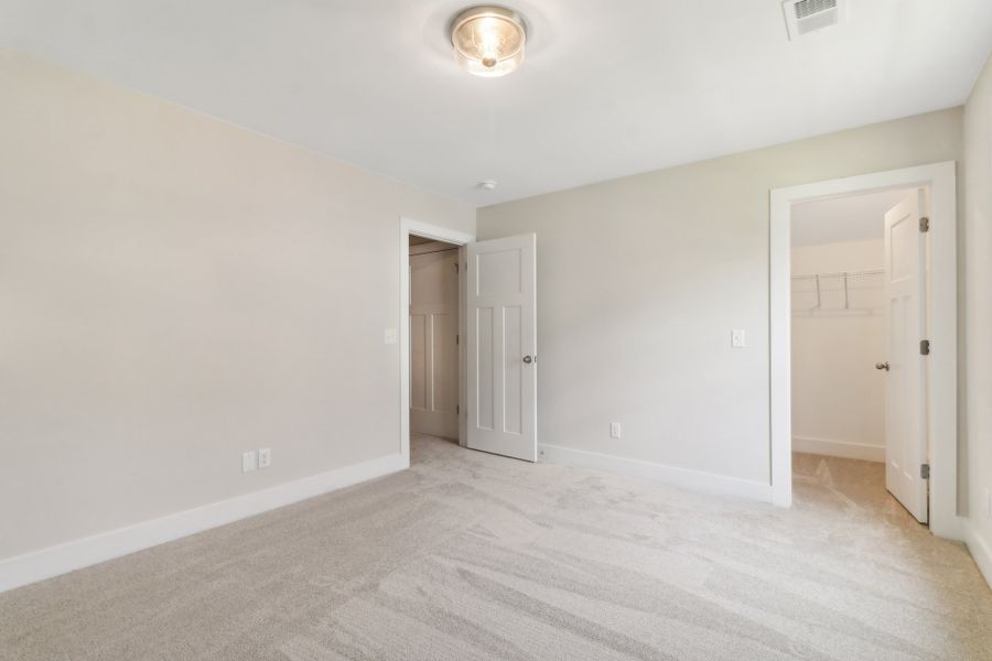 Representative unfurnished interior of a home built from the Connor II by Great Southern Homes in Edwards Ridge, Central (Image 27).