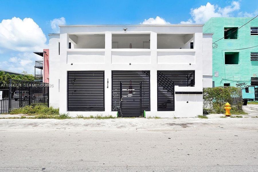 Front exterior of a new home in , Miami, FL, highlighting curb appeal (Image 22).
