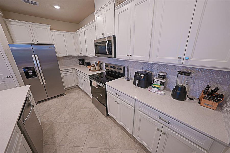 Furnished interior view inside a new home in , Clermont (Image 45).