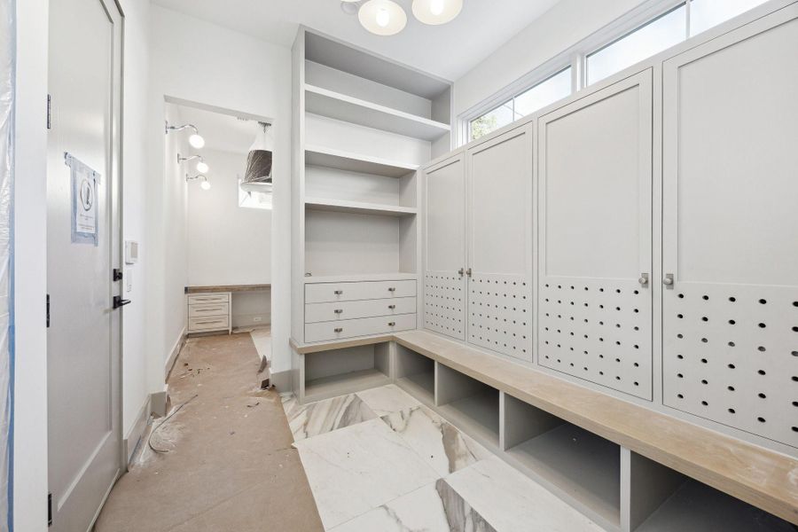 Mud Area with built-in lockers off of the garage entrance of the home.